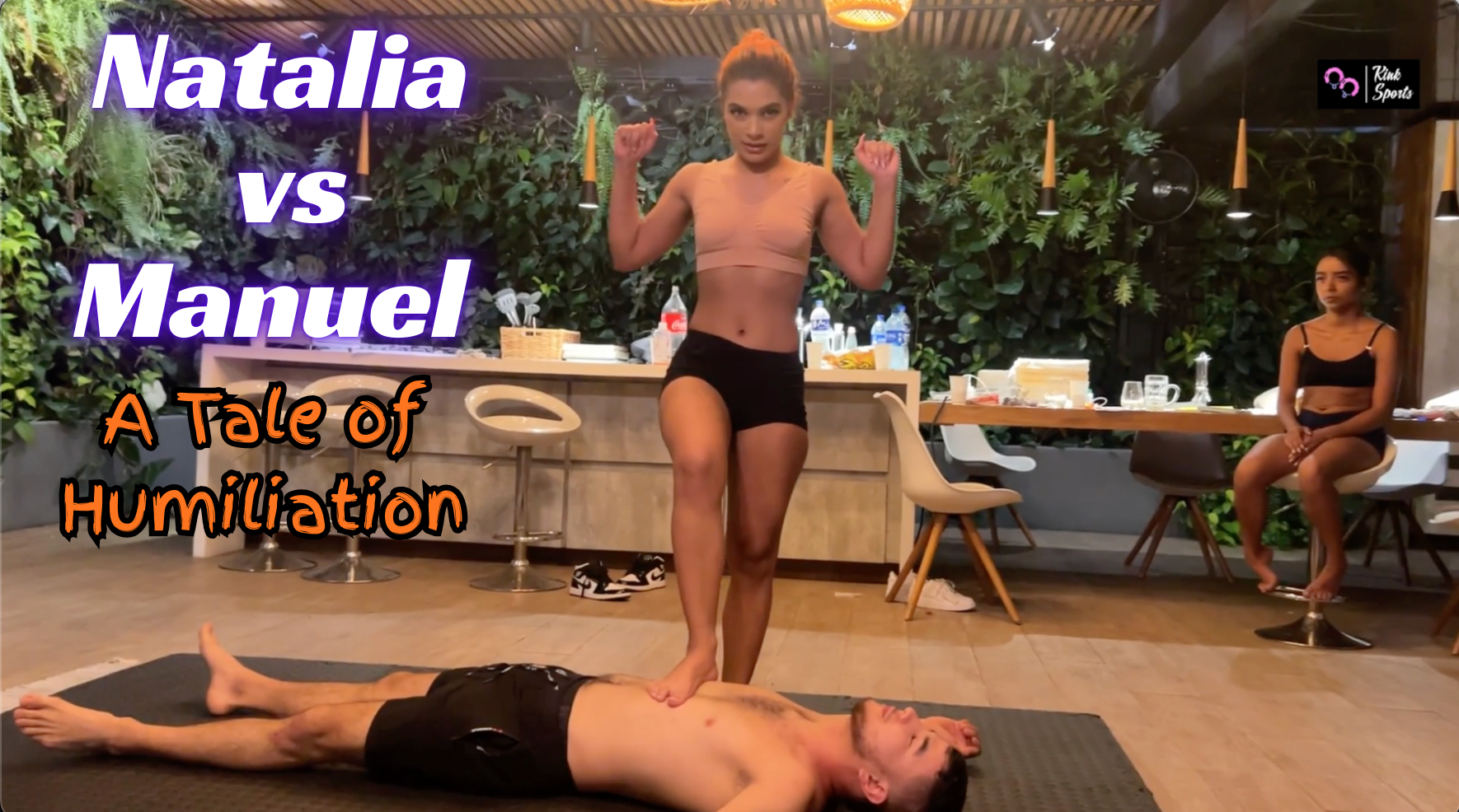 Natalia does a foot on the chest victor pose after defeating her opponent