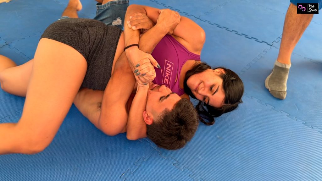 Athletic Pauline overpowers her male opponent