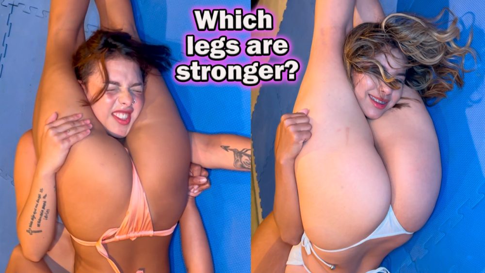 Two young women test their leg squeeze power against one another